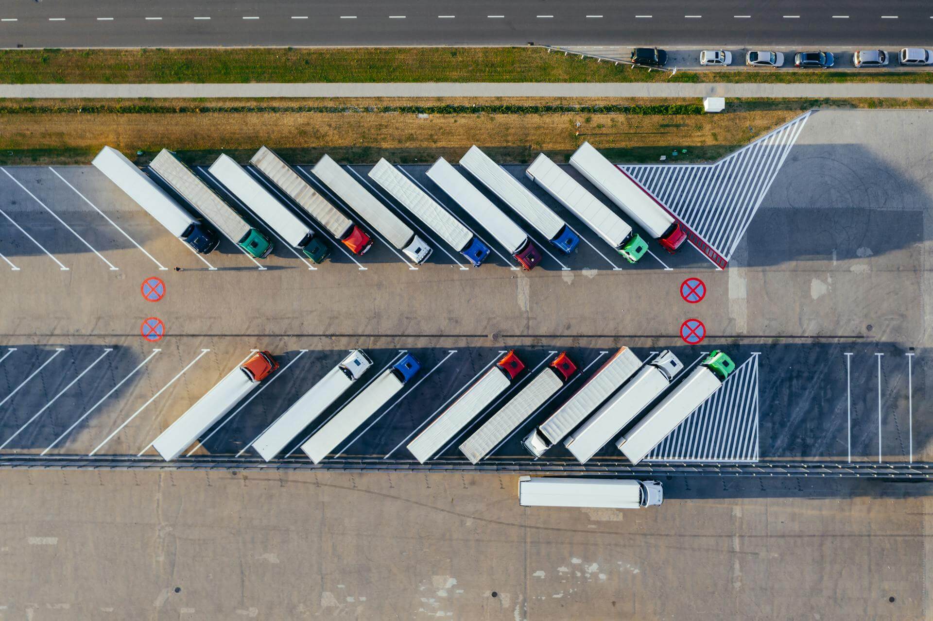 Trucks standing in rows ariel view